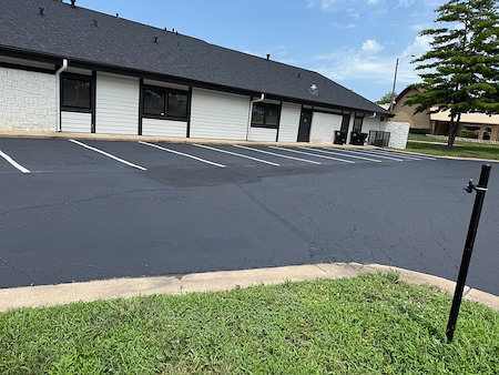 Top Signs Your Kansas City Parking Lot Needs Asphalt Repair Now