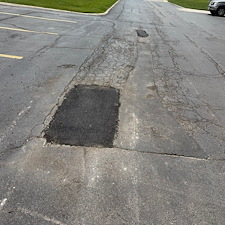 Mill and Patch Asphalt Repair at Summit Point Apartments in Lee’s Summit, MO 1